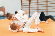 Boys in uniform practice martial art