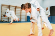 Kid judo, young fighters on training, self-defense